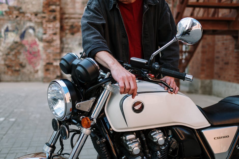 A diagnostic tool connected to a BMW motorcycle, showcasing its capabilities.